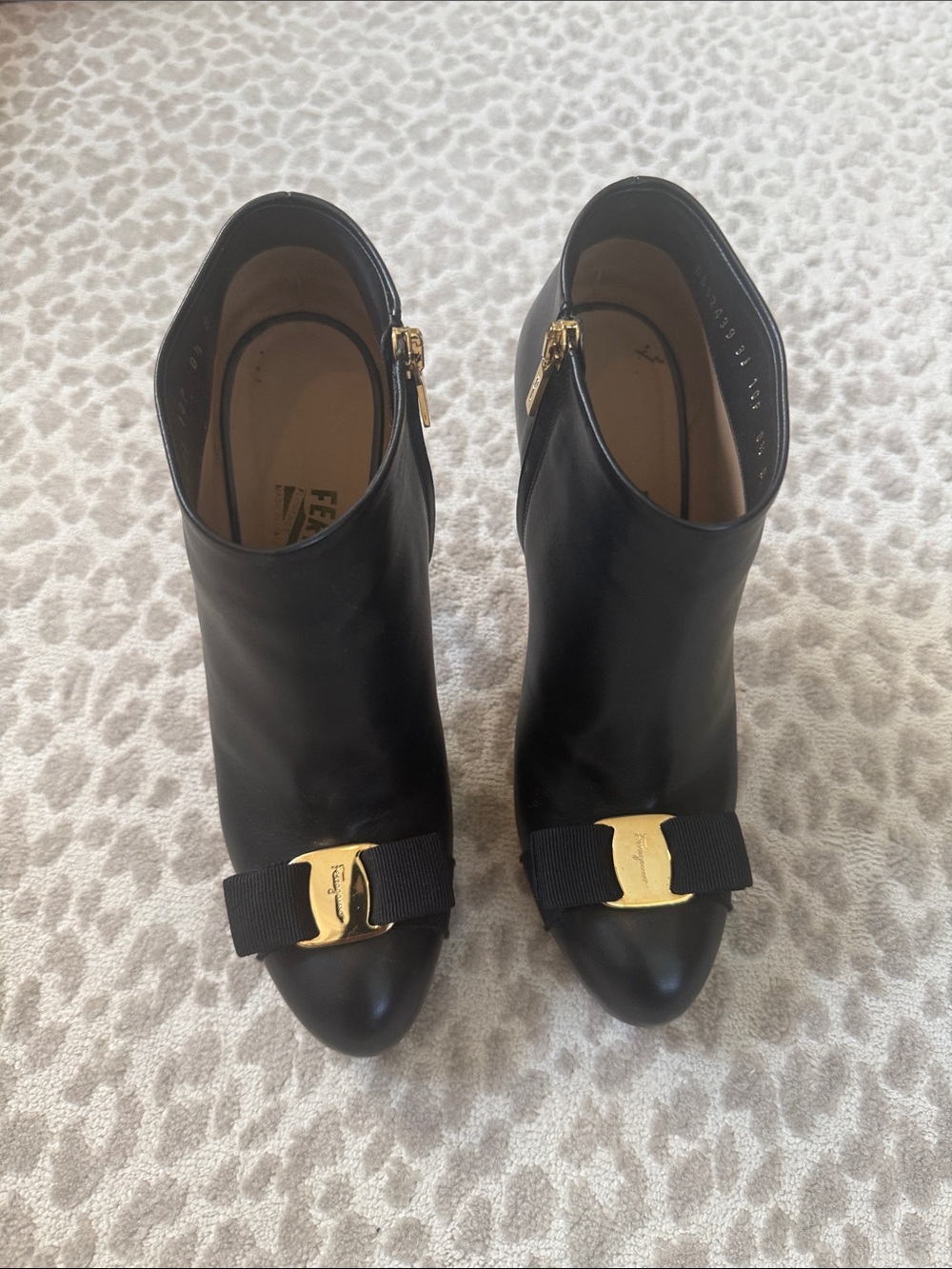 Salvatore Ferragamo Black Leather Ankle Booties with Gold Bow Plaque